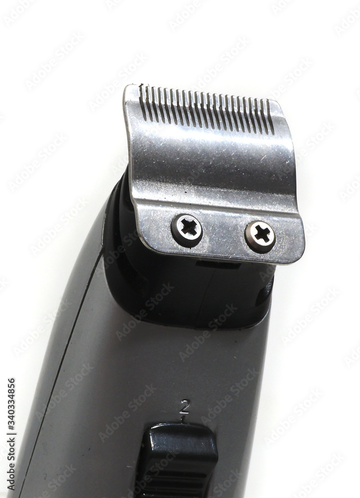 Hair clipper isolated in blue color, barber concept Hair clipper isolated in blue color, barber concept
