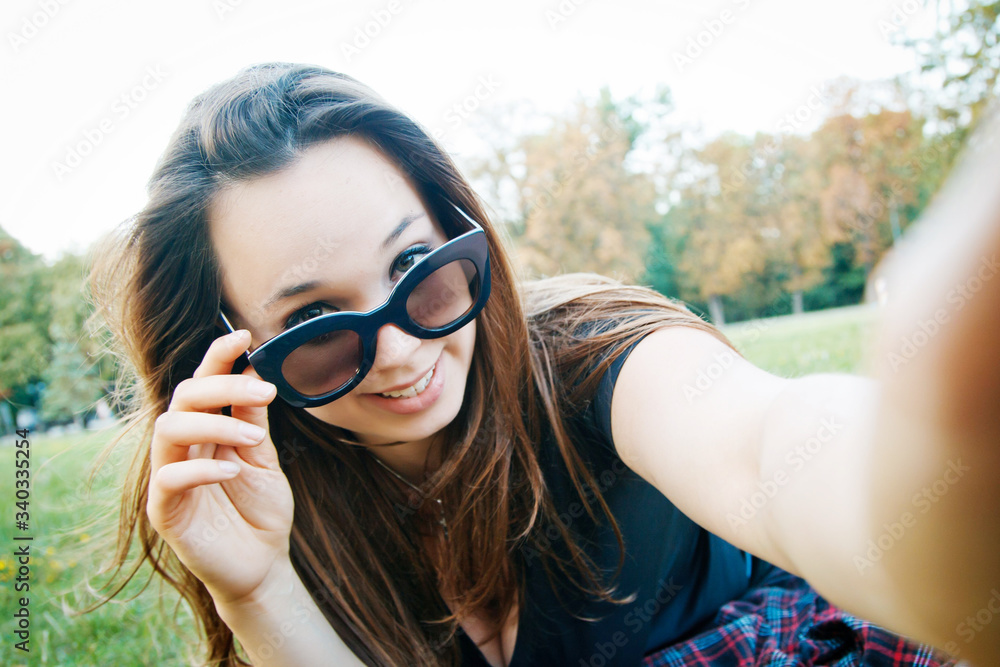 girl student lies on the grass girl student lies on the grass