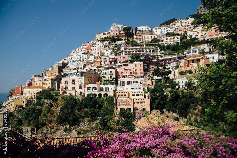 Obraz premium Houses and hotels built on rocks in the beautiful city of Positano in Italy