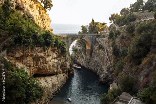 landscape a beautiful place in Italy Amalfi Furore stone bridge over the sea