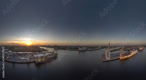 Panorama of the sunset over the Hamburg harbour
