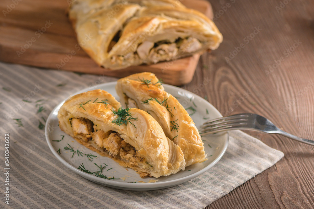 Homemade chicken pie on wooden background Homemade chicken pie on wooden background
