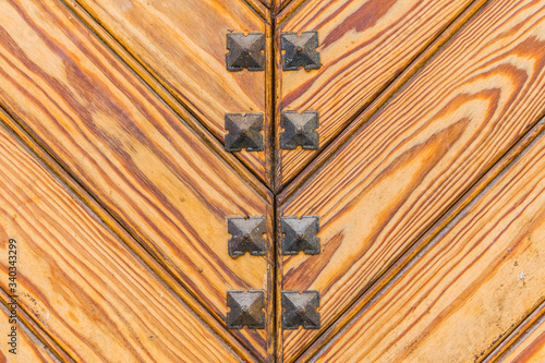 Studded wooden door photo