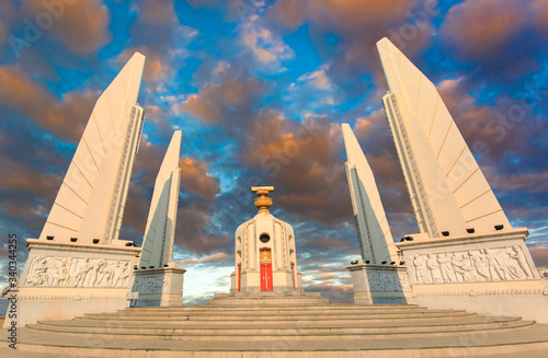 Photography Democracy monument in the centre of Bangkok, Thailand ,sunrise with clouds, ligh
