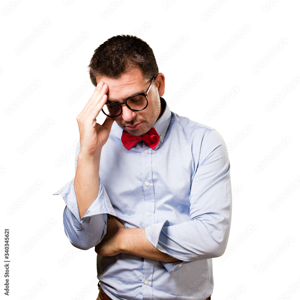 Man wearing a red bow tie. Looking tired. Man wearing a red bow tie. Looking tired.
