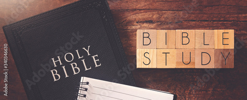 Bible Study in Block Letters on a Wooden Table with a Holy Bible photo