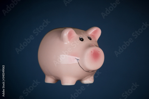  Piggy bank over background