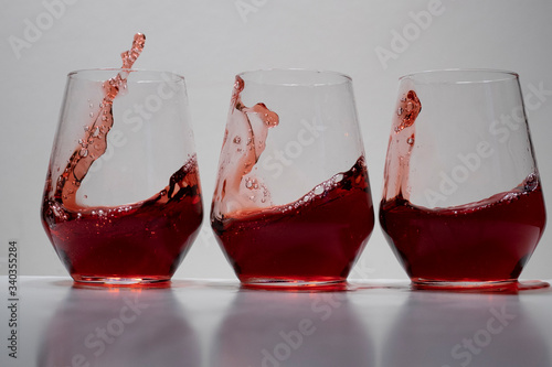 juice splash in a drinking glass photo