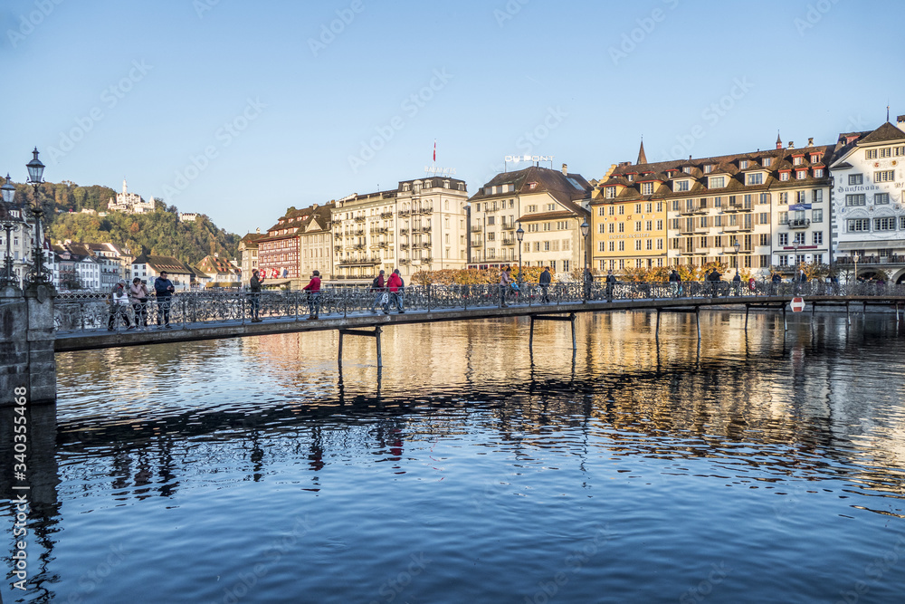 Lucerne reflected in the water in a sunny day