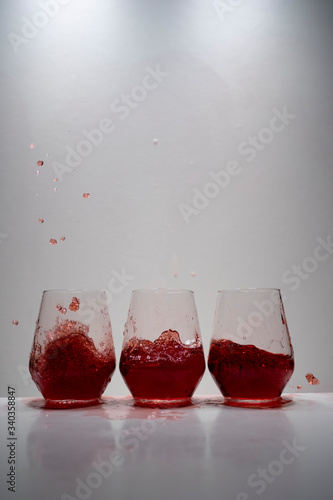 juice splash in a drinking glass photo