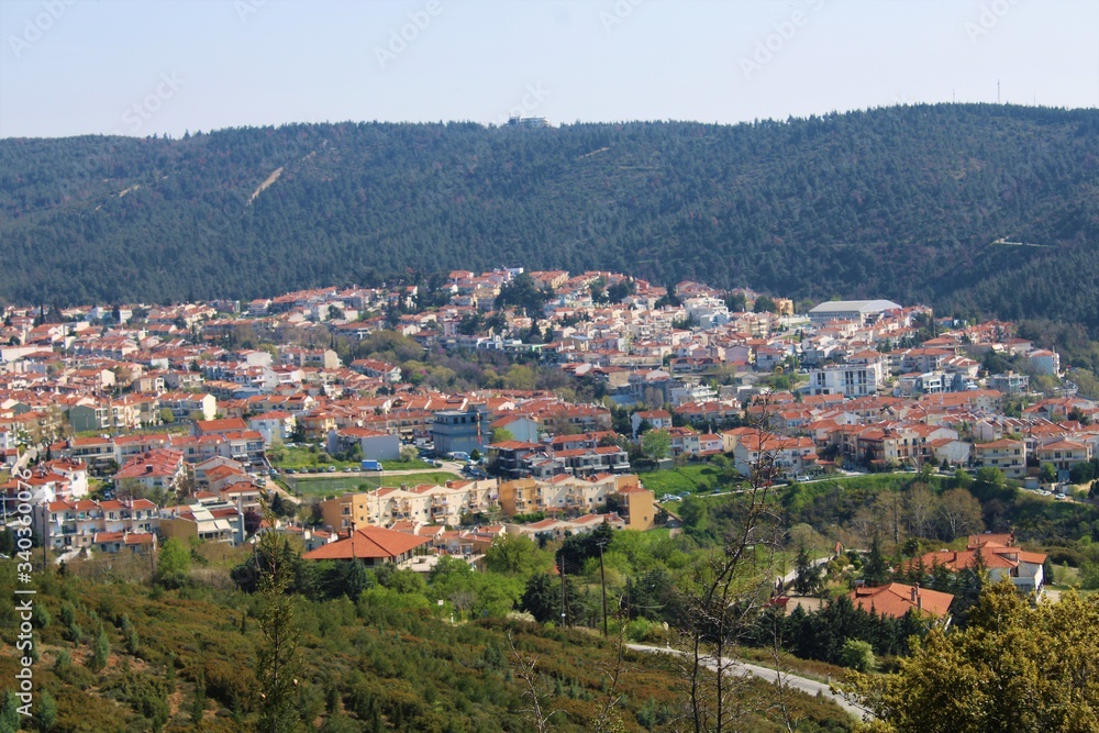 View of the city in a valley surrounded by mountains