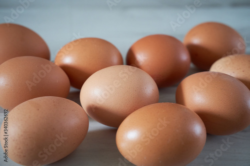 Organic eggs on a wooden background
