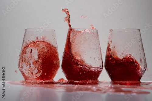 juice splash in a drinking glass photo