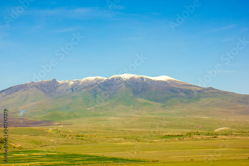 landscape with mountains and clouds, mountain landscape in the summer, landscape with mountains and blue sky