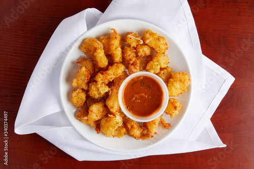 Fried cheese curds and dipping sauce photo