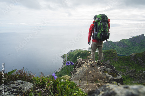 hiker with heavy backpack on Lofoten