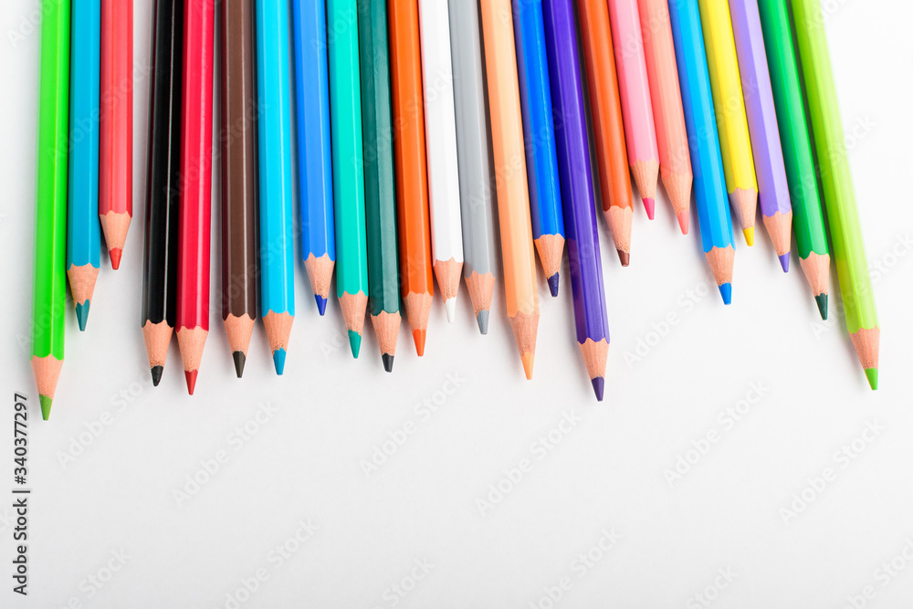 Group of many mixed colourful pencils isolated on a white paper, children school or office suppliers photographed with soft focus from side view, with space for text
Group of many mixed colourful pencils isolated on a white paper, children school or office suppliers photographed with soft focus from side view, with space for text