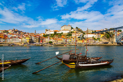 Porto, Portugal, Riberia old town cityscape and the Douro River with traditional Rabelo boats © Michal Ludwiczak