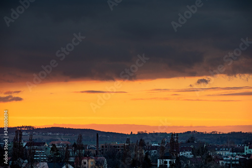 Beautiful sundawn twilight over the city. Horizont, sky with clouds. © Eliška