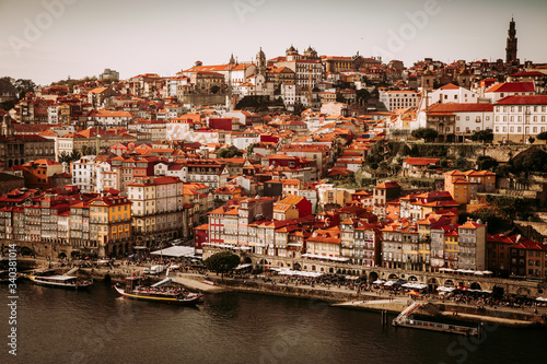 Porto, Portugal, amazing view of Riberia district with historical houses and Douro river seen from Ponte de Dom Luis bridge photo