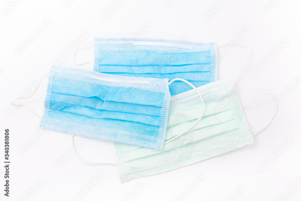 Fototapeta premium Medical mask isolated on white background,Face mask protection against pollution, virus, flu and coronavirus. Health care and surgical concept.