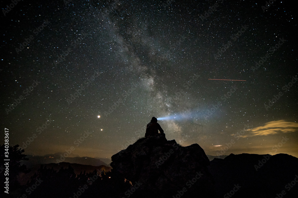 milky way during eclipse with person in foreground milky way during eclipse with person in foreground