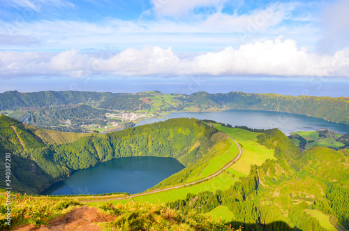 Viewpoint Miradouro da Boca do Inferno in Sao Miguel Island, Azores, Portugal. Amazing crater lakes surrounded by green fields and forests. Beautiful Portuguese landscape. Horizontal photo photo