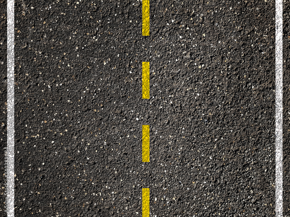 Fototapeta premium Yellow line on asphalt road background