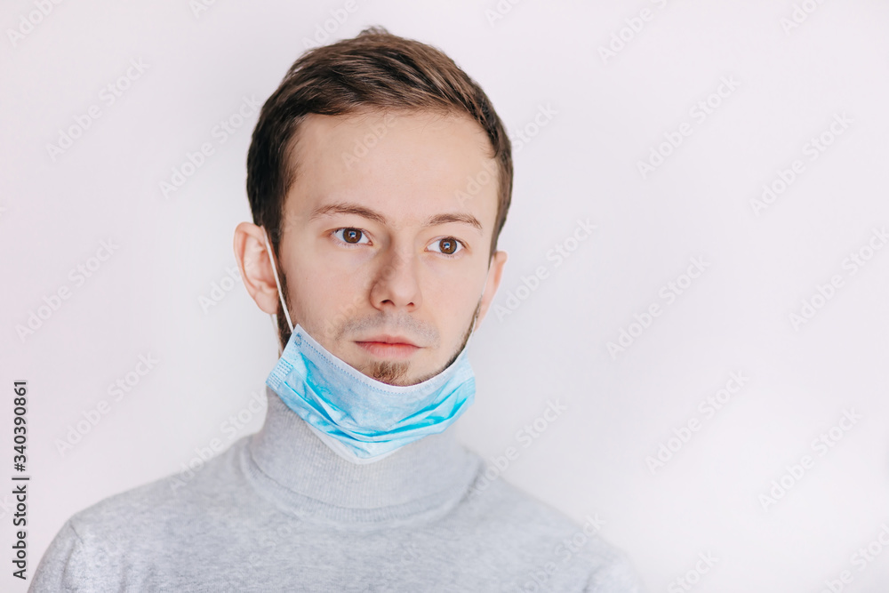 Man wearing a medical mask, covid-19 and coronavirus Man wearing a medical mask, covid-19 and coronavirus