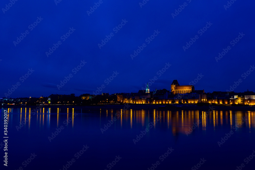 Evening view to the city of Torun, Poland Evening view to the city of Torun, Poland