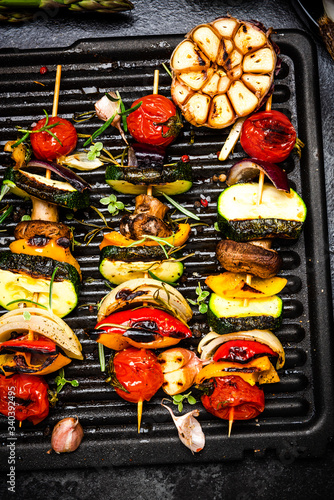BBQ Grilled Wegetables on Skewers with Fresh Herbs and Spices. Summer Barbecue Food © marcin jucha