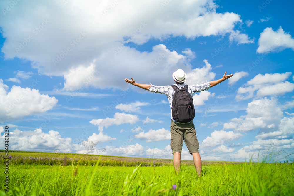 Happy man outdoors in nature enjoying a beautiful summer day Happy man outdoors in nature enjoying a beautiful summer day