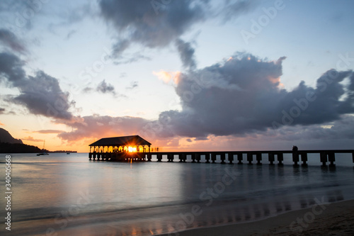 hanalei pier, hanalei, bay of water, evening, dock, sunset on the beach, beach sunset, beach side, beachside, beach, fishing dock, sun flare, sun flare background, tranquil background, silhouette, vac