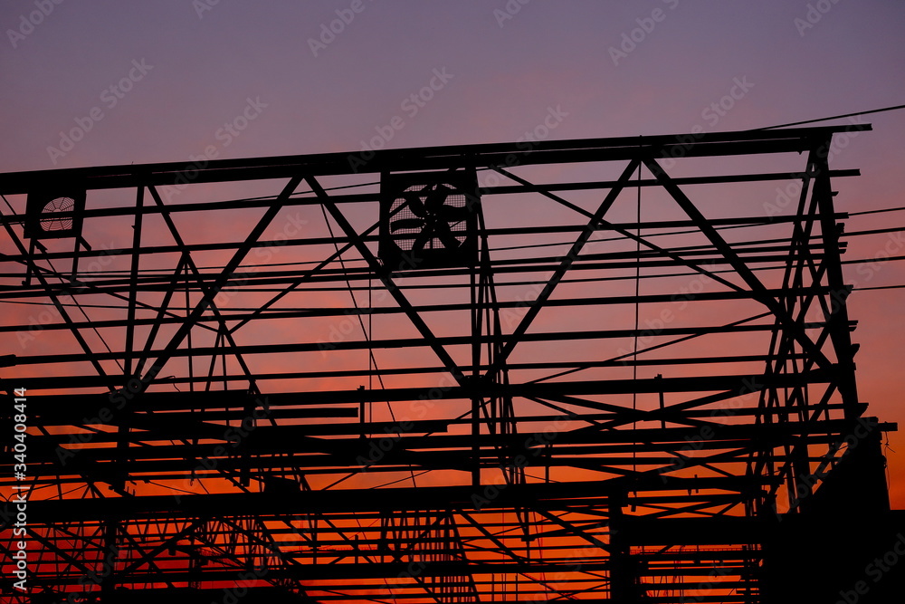 Ταπετσαρία Sunset in the background of a building skeleton