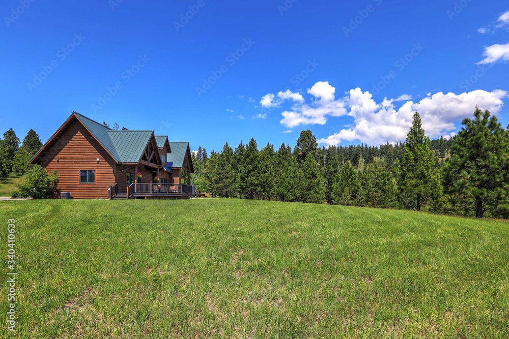 Amazing beautiful mountain home in Cascade Mountains in USA with green lavish maountains, cedar large home.