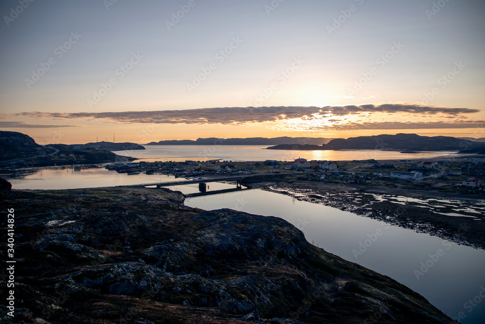 Panoramic view of the fishing village and the sea at sunrise.