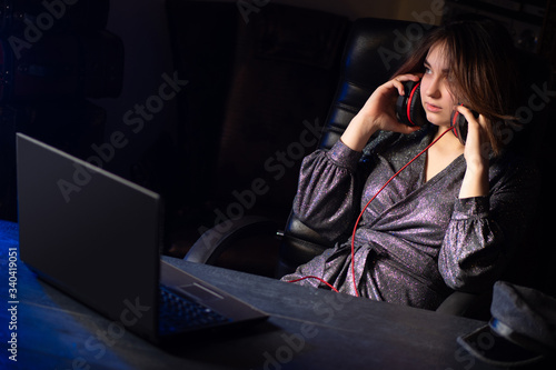 Girl listens to music. Youn...