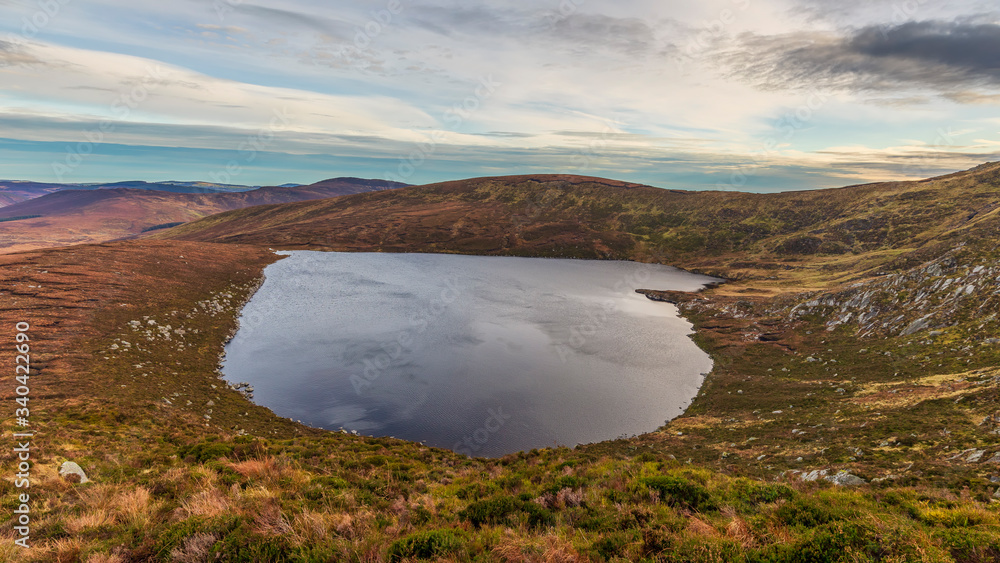 Aerial Lough Ouler – Ireland’s Heart-Shaped Lake The lake, called Lough Ouler, is tucked away at the side of Tonelagee mountain. Tonelagee is a translation of the Irish Tóin le Gaoith
