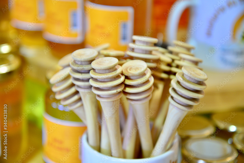Set of honey spoons in honey shop Set of honey spoons in honey shop