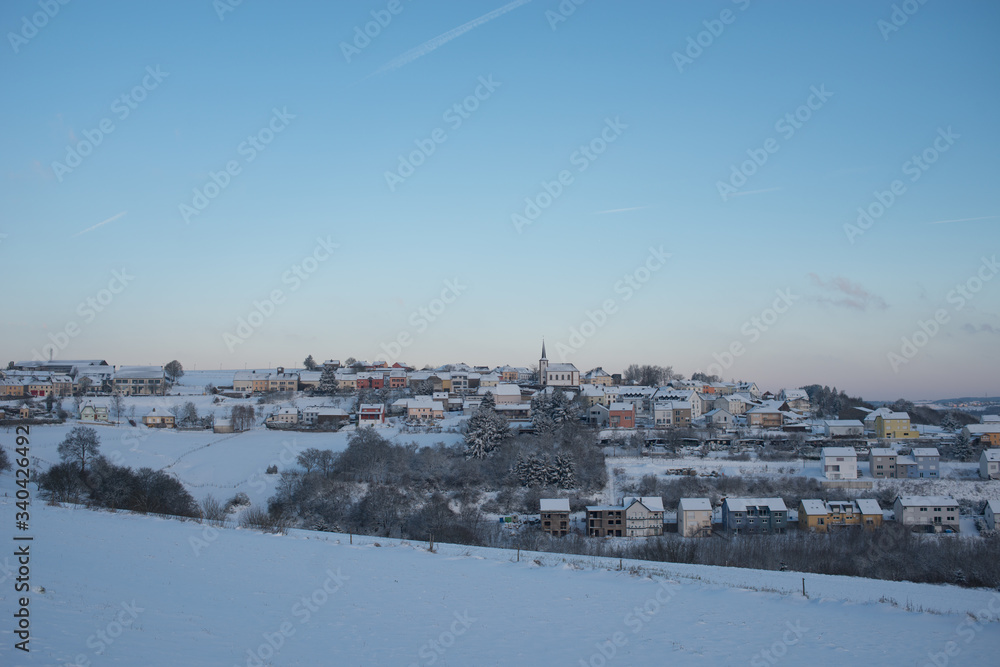 Snowy village in Luxembourg
