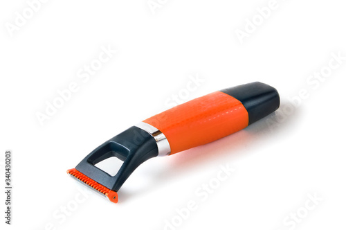 Orange and black beard trimmer or groomer isolated on white