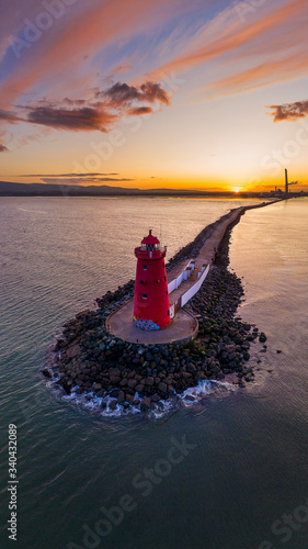 Aerial view Sunset Poolbeg lighthouse in Ireland, Dublin bay Pier to Poolbeg Lighthouse in Ireland