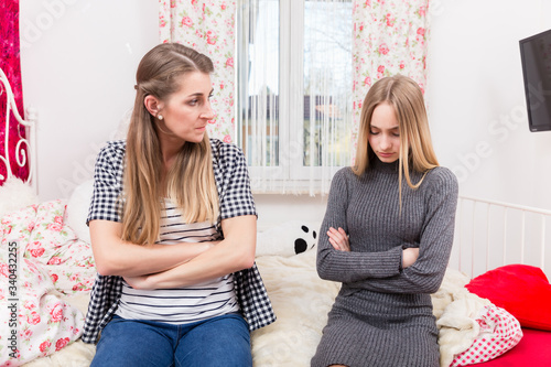 Mother and daughter arguing photo