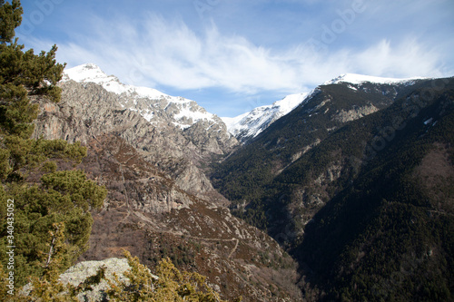 .Catalan Pyrenees landscape, snowy mountains in the background.