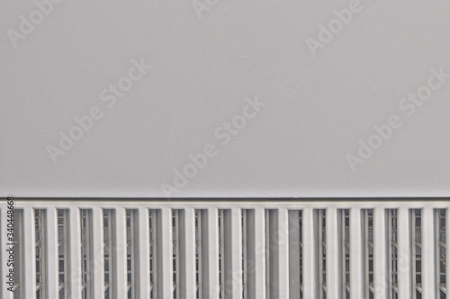 Gray metal surface with a grid at the bottom of two halves  background  copy space
