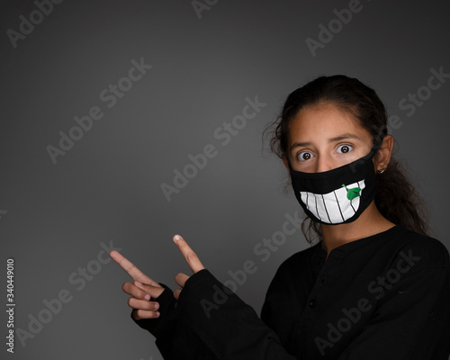 Girl Social Distancing Pointing at empty space