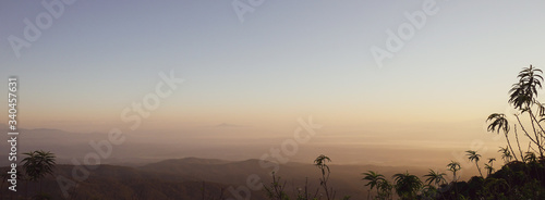 Landscape view mountain high on blue sky at north THAILAND.Holiday travel wildlife.Panorama scene nature forest morning view high angle.Winter season wonderful.Plant scenery fog beautiful outdoor hill