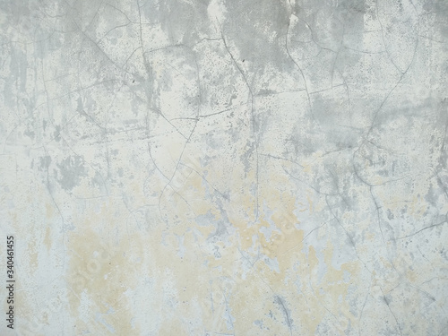 Dirty and Old cement wall texture background. Grunge background with peeling paint. Wall texture can be used as a wall frame and wall background.