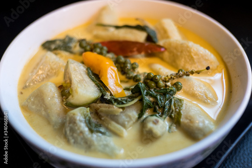 Green curry is a Thai food with fish ball ingredients.