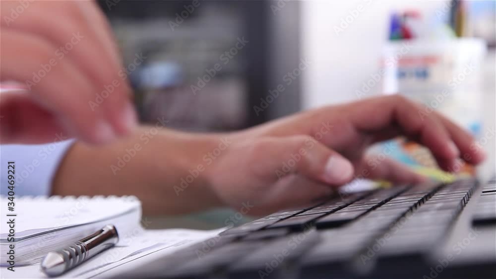 Hands typing on computer keyboard Hands typing on computer keyboard